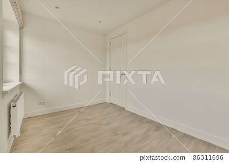 Empty room, flat with a ceiling, parquet floor, and white walls Empty room, flat with a ceiling, parquet floor, and white walls 86311696