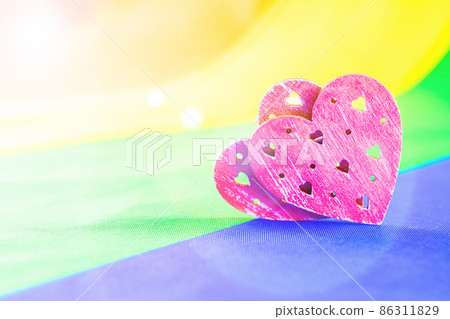 Hearts background homosexual lesbian concept. Two hearts lgbtq, gay, transgender love symbol. LGBT pride day celebration. Hearts background homosexual lesbian concept. Two hearts lgbtq, gay, transgender love symbol. LGBT pride day celebration. 86311829