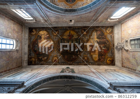 Ostuni, Puglia, Italy. August 2021. Amazing internal view of the frescoed vault of the Co-Cathedral of Santa Maria Assunta in Cielo. 86312259