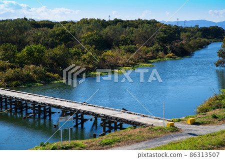 Submerged bridge Oppe River Hachiman Bridge scenery Submerged bridge Oppe River Hachiman Bridge scenery 86313507