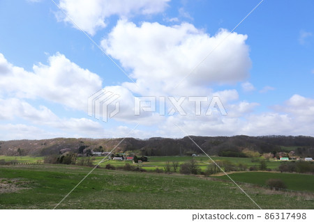 Scenery with a farm in the Hidaka region of Hokkaido Scenery with a farm in the Hidaka region of Hokkaido 86317498