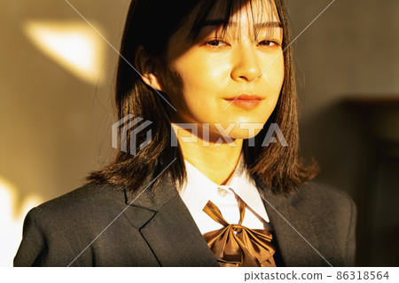 High school girl bathing in the setting sun 86318564