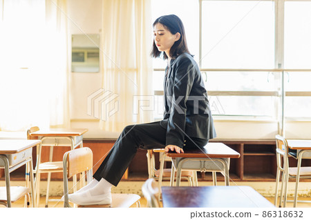 High school girl wearing a genderless uniform 86318632