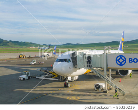 Mongolian aircraft B-767 arriving in Ulaanbaatar, Mongolia 86320239