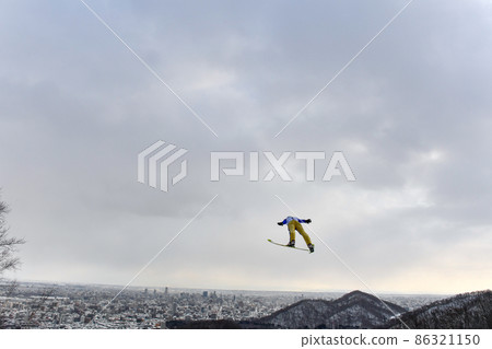 Ski jumps and the cityscape of Sapporo 86321150