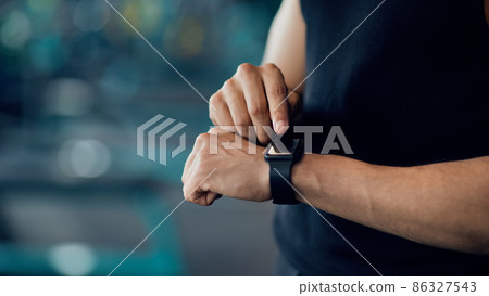 Sport Gadgets Concept. Unrecognizable Male Athlete Checking His Fitness Activity On Smartwatch 86327543