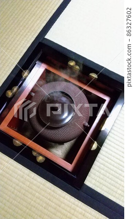 Steam from the tea room furnace 86327602