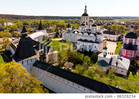 Side view of the walls and temples of the ancient Orthodox Pafnutiy Borovsky Monastery. Borovsk, Russia Side view of the walls and temples of the ancient Orthodox Pafnutiy Borovsky Monastery. Borovsk, Russia 86328234