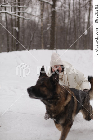 smiling girl hugs her dog smiling girl hugs her dog 86329281