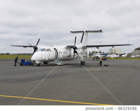 Safari Link Machine DHC-8 after arriving at Nairobi Airport, Kenya 86329288