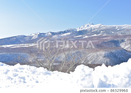 A clear snow scene, overlooking the summit of Mt. Azumaya from Manza Kogen A clear snow scene, overlooking the summit of Mt. Azumaya from Manza Kogen 86329968