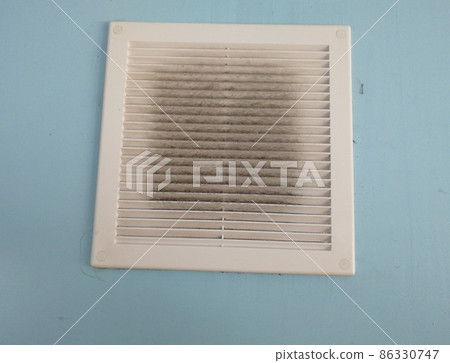 Dirty air ventilation grill hatch. Background lattice of exhaust hood. Dirty air ventilation grill hatch. Background lattice of exhaust hood. 86330747