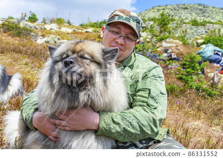 Friendship between man and dog. Walking trips with pets Friendship between man and dog. Walking trips with pets 86331552