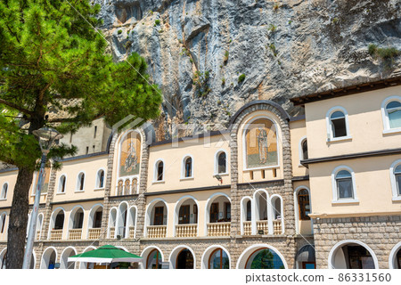 Monastery built into a mountain 86331560