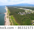 Coastline with a windmill 86332373