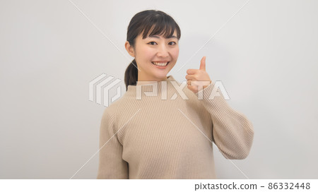 Positive and energetic young woman Positive and energetic young woman 86332448
