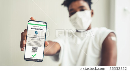 African American teenager shows vaccine passport on mobile phone African American teenager shows vaccine passport on mobile phone 86332832