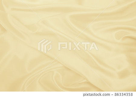 Smooth elegant golden silk or satin luxury cloth texture as wedding background. Luxurious background design. In Sepia toned. Retro style Smooth elegant golden silk or satin luxury cloth texture as wedding background. Luxurious background design. In Sepia toned. Retro style 86334358