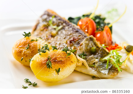 baked fish with potatoes baked fish with potatoes 86335160