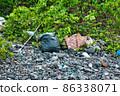 Trash around the Ko Hin Ngam rocky island 86338071