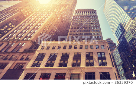 Retro toned picture of Manhattan diverse architecture, New York City, USA. Retro toned picture of Manhattan diverse architecture, New York City, USA. 86339370