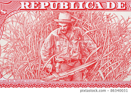 Che Guevara cutting sugar cane from Cuban money 86340031