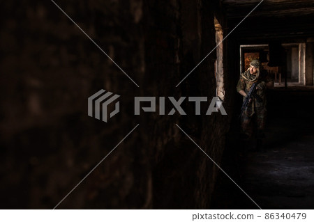 The Arab soldier with the AK-47 Kalashnikov assault rifle 86340479