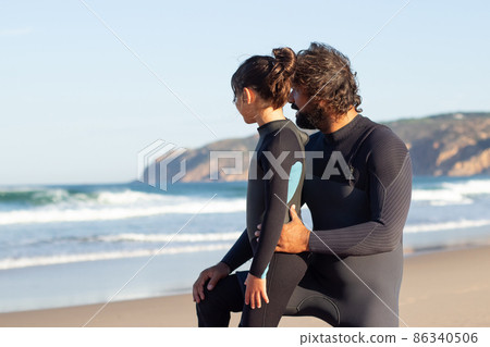 Tender father and daughter near ocean 86340506