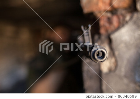 Soldier in the war to aim with weapons 86340599