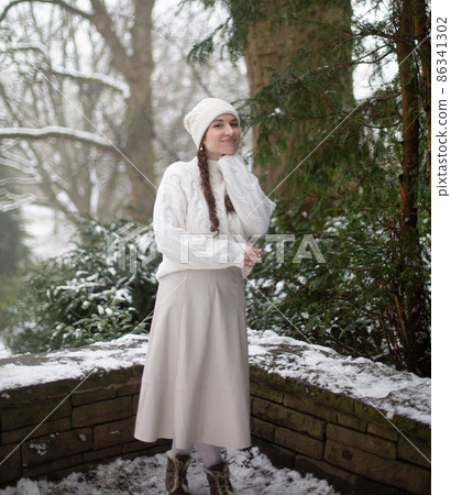 White european young woman in park White european young woman in park 86341302