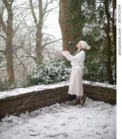 White european young woman in park White european young woman in park 86341304