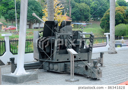 PORT DICKSON, MALAYSIA -MAY 08, 2016: Old war cannon restored and display for public at Malaysia Army Museum or Muzium Tentera Darat in Port Dickson, Negeri Sembilan, Malaysia. 86341828
