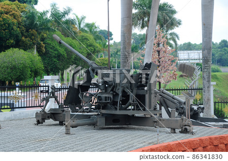 PORT DICKSON, MALAYSIA -MAY 08, 2016: Old war cannon restored and display for public at Malaysia Army Museum or Muzium Tentera Darat in Port Dickson, Negeri Sembilan, Malaysia. PORT DICKSON, MALAYSIA -MAY 08, 2016: Old war cannon restored and display for public at Malaysia Army Museum or Muzium Tentera Darat in Port Dickson, Negeri Sembilan, Malaysia. 86341830