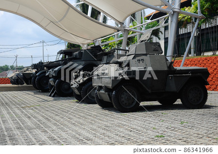 PORT DICKSON, MALAYSIA -MAY 08, 2016: Old army armor vehicle and tanks restored and display for public at Malaysia Army Museum or Muzium Tentera Darat in Port Dickson, Negeri Sembilan, Malaysia. PORT DICKSON, MALAYSIA -MAY 08, 2016: Old army armor vehicle and tanks restored and display for public at Malaysia Army Museum or Muzium Tentera Darat in Port Dickson, Negeri Sembilan, Malaysia. 86341966