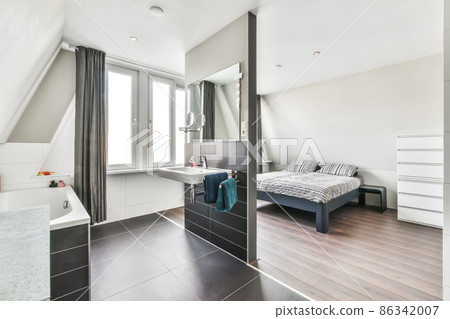 Beautiful bedroom in new luxury home with some decor 86342007