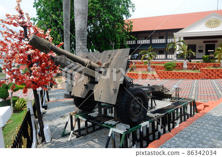 PORT DICKSON, MALAYSIA -MAY 08, 2016: Old war cannon restored and display for public at Malaysia Army Museum or Muzium Tentera Darat in Port Dickson, Negeri Sembilan, Malaysia. 86342034
