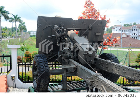 PORT DICKSON, MALAYSIA -MAY 08, 2016: Old war cannon restored and display for public at Malaysia Army Museum or Muzium Tentera Darat in Port Dickson, Negeri Sembilan, Malaysia. 86342035