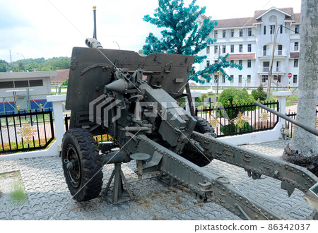PORT DICKSON, MALAYSIA -MAY 08, 2016: Old war cannon restored and display for public at Malaysia Army Museum or Muzium Tentera Darat in Port Dickson, Negeri Sembilan, Malaysia. PORT DICKSON, MALAYSIA -MAY 08, 2016: Old war cannon restored and display for public at Malaysia Army Museum or Muzium Tentera Darat in Port Dickson, Negeri Sembilan, Malaysia. 86342037