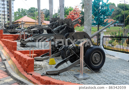 PORT DICKSON, MALAYSIA -MAY 08, 2016: Old war cannon restored and display for public at Malaysia Army Museum or Muzium Tentera Darat in Port Dickson, Negeri Sembilan, Malaysia. 86342039