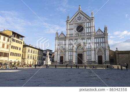 Dante Alighieri in front of the church of Santa Croce in Florence, Italy 86342358