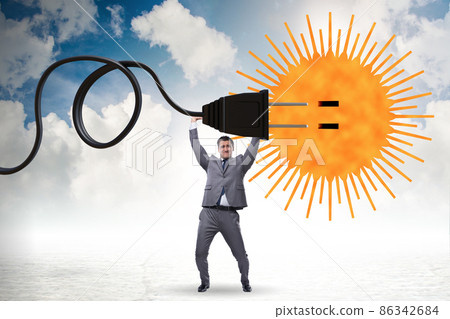 Businessman in solar energy concept Businessman in solar energy concept 86342684