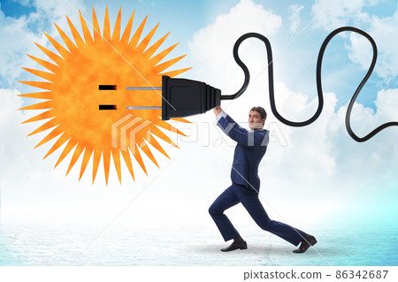 Businessman in solar energy concept 86342687