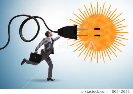 Businessman in solar energy concept Businessman in solar energy concept 86342691