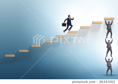 Teamwork concept with businessmen helping each other 86342802