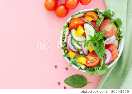 Green salad with tomato and fresh vegetables Green salad with tomato and fresh vegetables 86343909