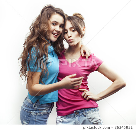 best friends teenage girls together having fun, posing emotional on white background, besties happy smiling, lifestyle people concept 86345931