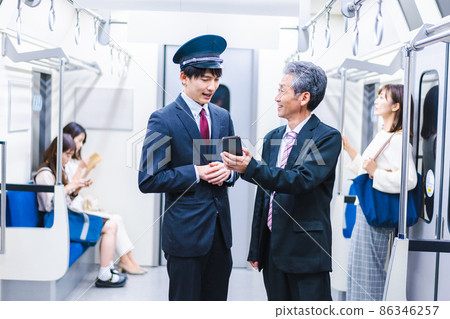 Train conductor who responds to customers 86346257