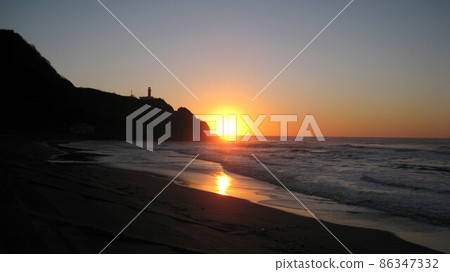 The Sea of Japan illuminated by the setting sun over Cape Kakuda 86347332