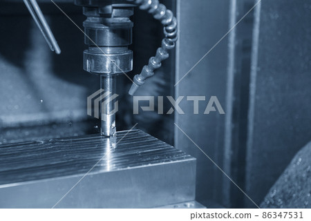 The CNC milling machine rough cutting the injection mold parts by indexable  endmill tools. 86347531