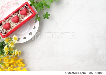 Heart-shaped chocolates and flowers | Image of Valentine's Day 86348086